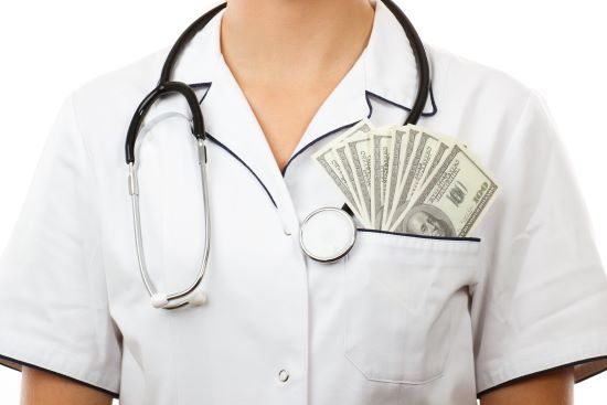 woman-doctor-with-stethoscope-and-currencies-dolla-PXJDABM